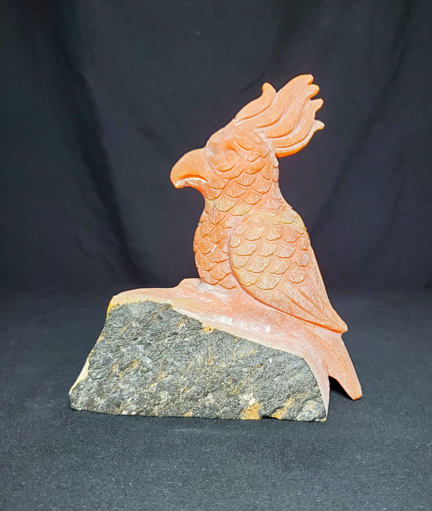 Orange Calcite Parrot Carving