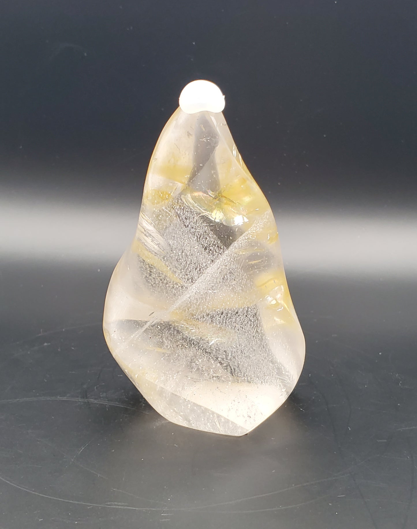 Clear Quartz and Golden Healer Flame Carving with Rainbow